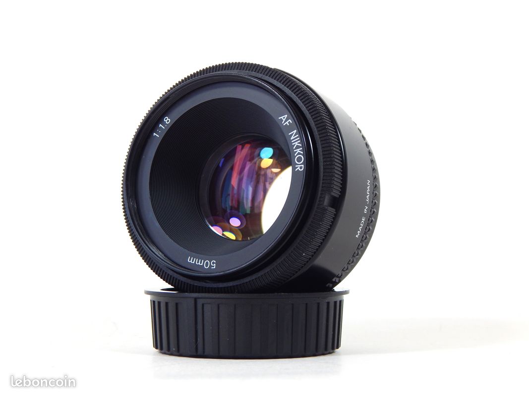 Objectif Nikon Série E 50mm F/1,8 – Monture AIS – Bouchons + Filtre L39 – TB