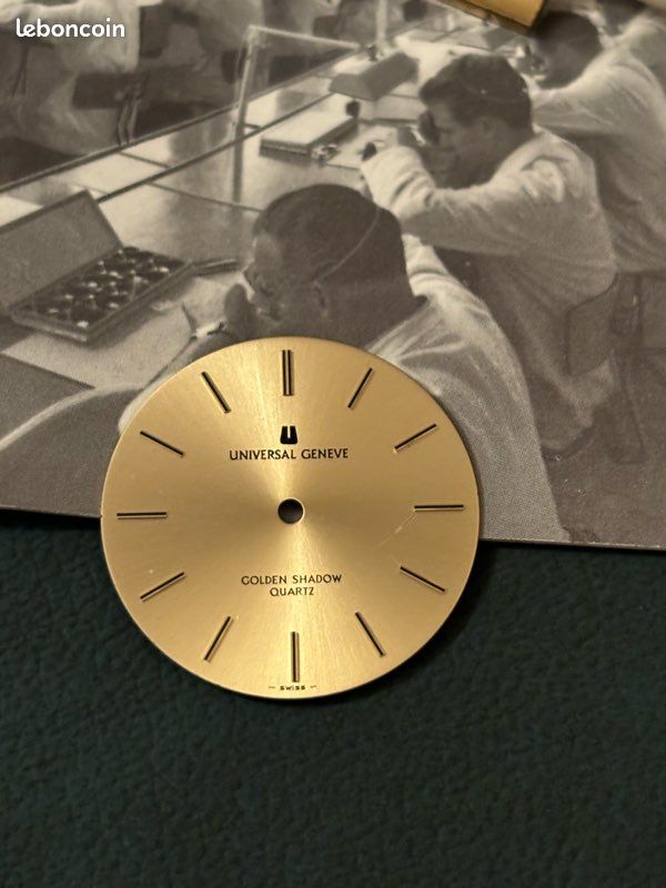 Universal Geneve cadran champagne Montres Bijoux