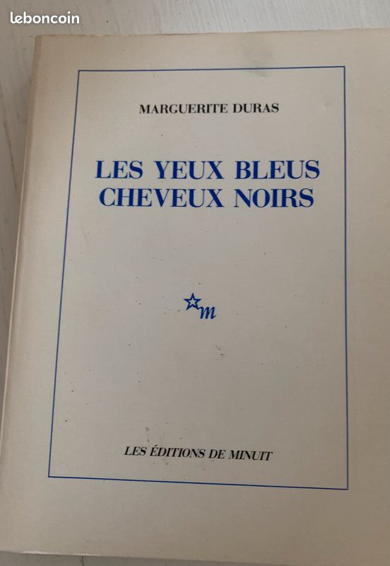 Les yeux bleus cheveux noirs (image 1)