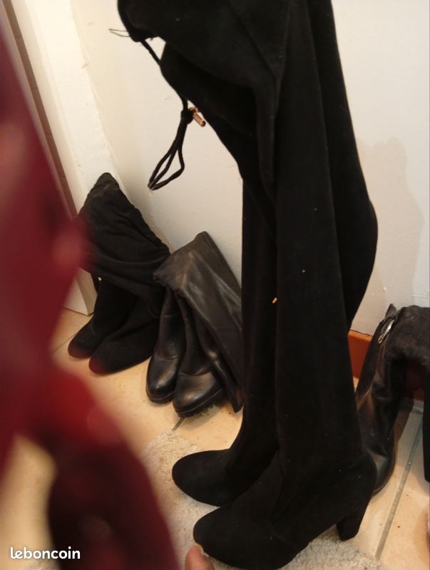 Bottes montantes noires à talons (image 1)
