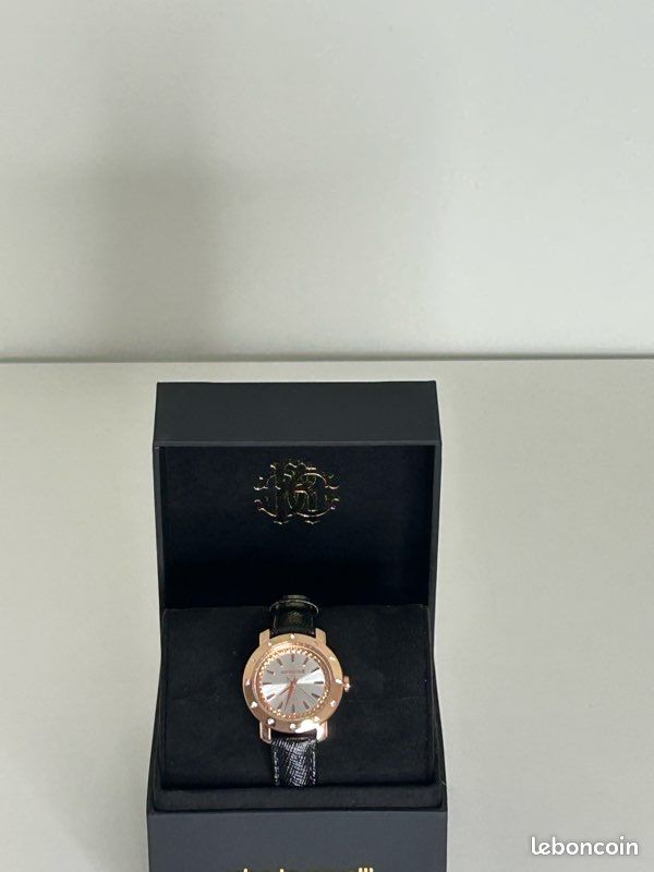 Montre Roberto Cavalli Pour Femme - Occasion - Fonctionne - Cadran Violet Métallisé
