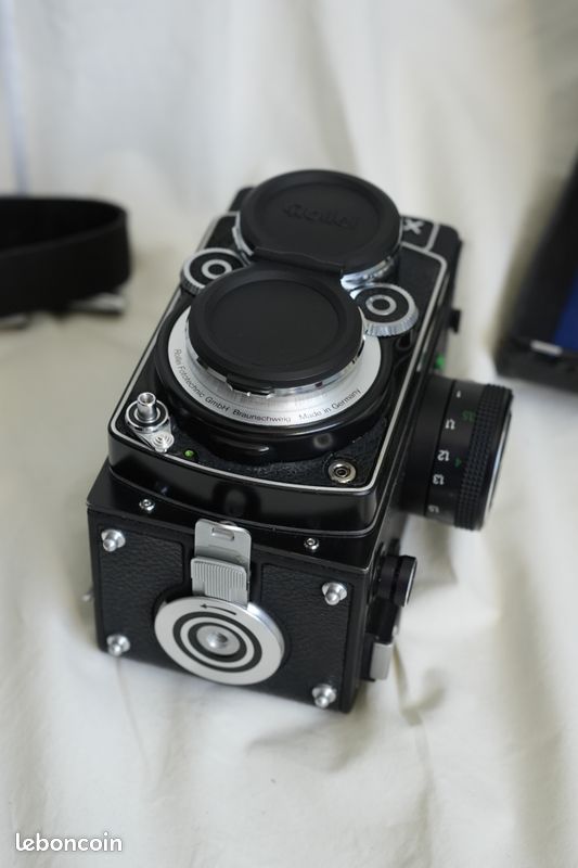 Rolleiflex 2.8 GX Planar avec sacoche rigide, notice et pare-soleil