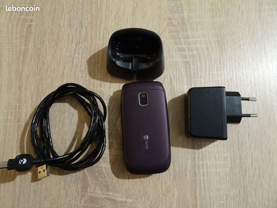 Téléphone à clapet , notice et accessoires (image 4)