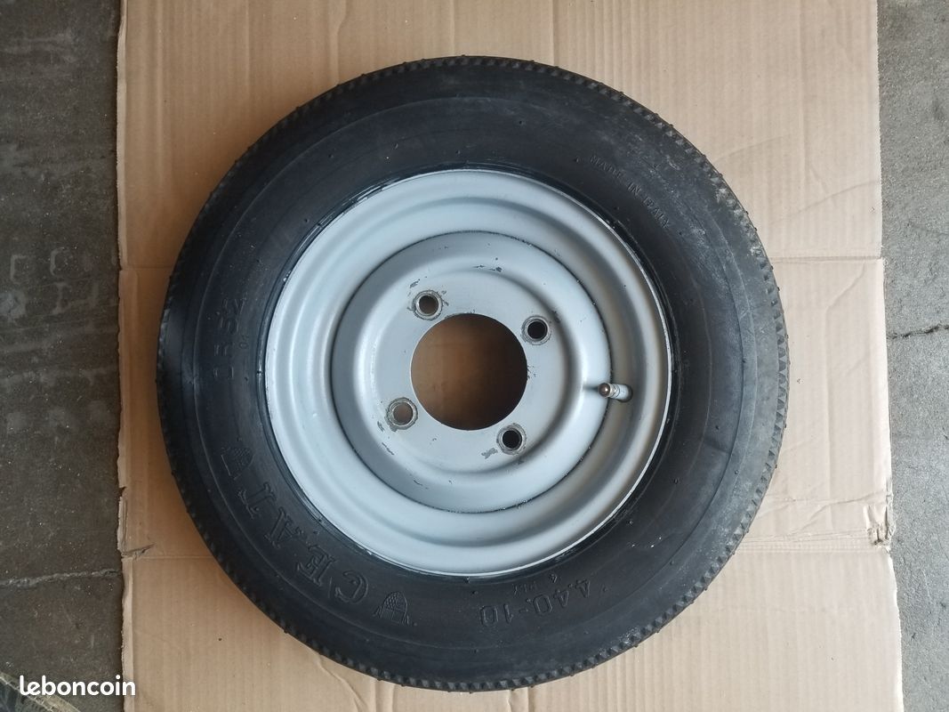 Roue remorque 10 pouces jante en tôle déport 8 cm extérieur pneu 4.40 X10 DR52 (image 1)