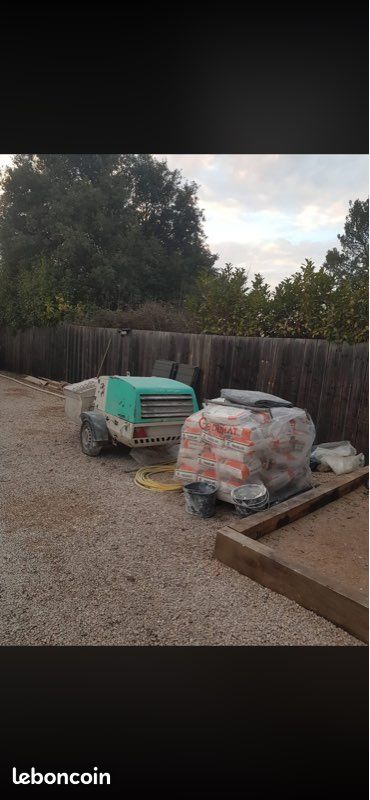 Machine à enduit de façade (image 1)