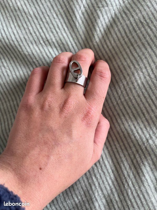 Bague femme acier inoxydable ajustable neuve jamais portée logo