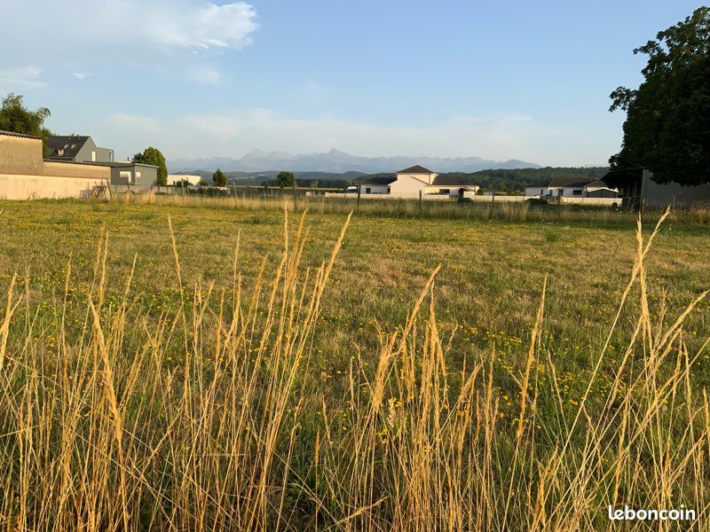 Terrain viabilisé 1000 m² – Ossun Sud – Plein sud, vue Pyrénées · 100 000 €
