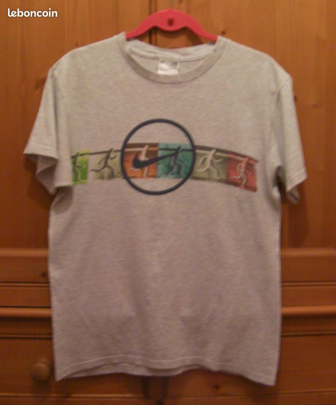 Tee-shirt gris marque NIKE - Taille 40 (image 1)