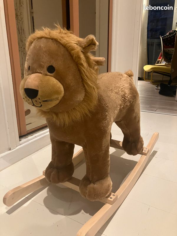 Lion à bascule (image 1)