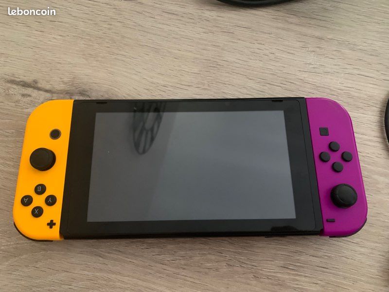 Console Nintendo switch + manette + 3 jeux (image 1)
