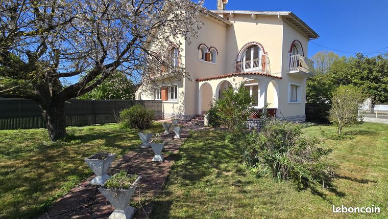T4 de 92m2 avec jardin et stationnements privatifs