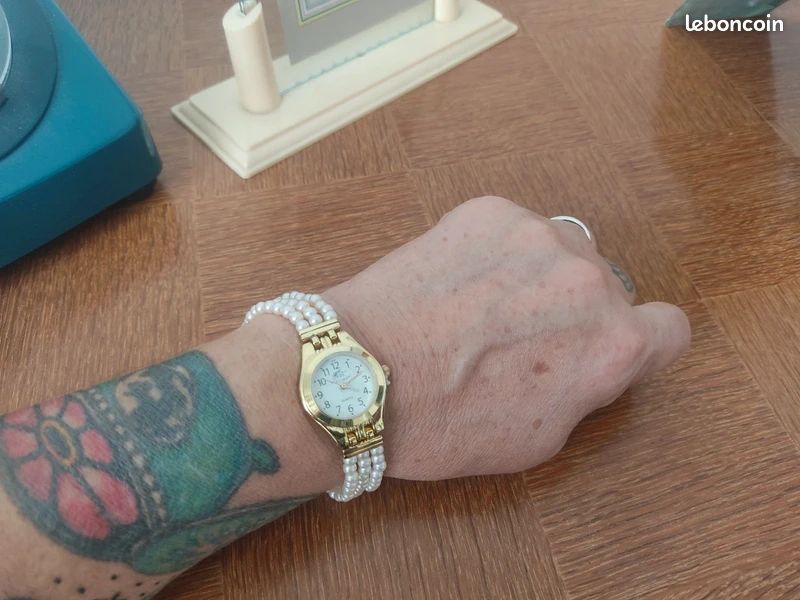 Jolie montre bracelet en perle (image 1)