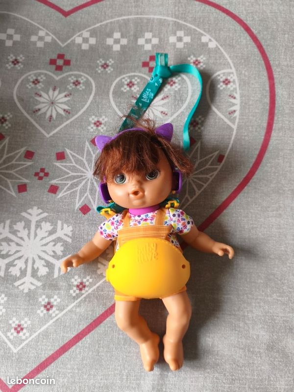 Petite poupée (image 1)