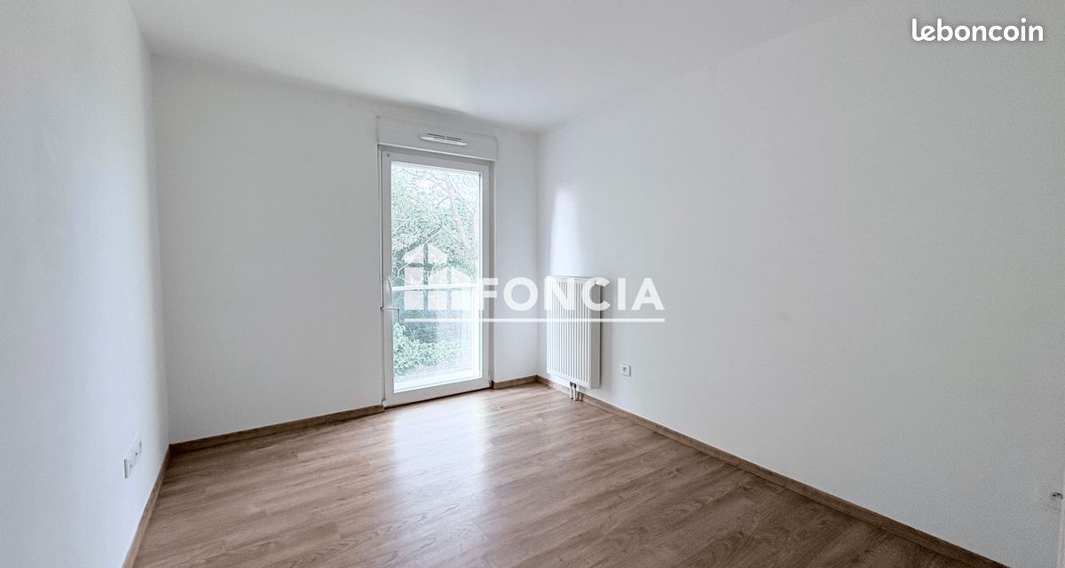 Appartement T3 avec balcon et parking privatif (image 7)