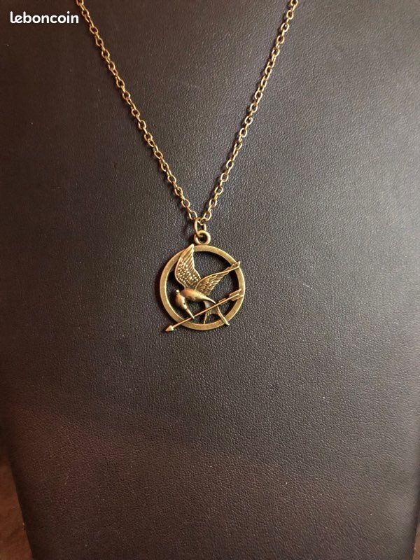 Pendentif The Hunger Game oiseau moqueur neuf Et (image 1)