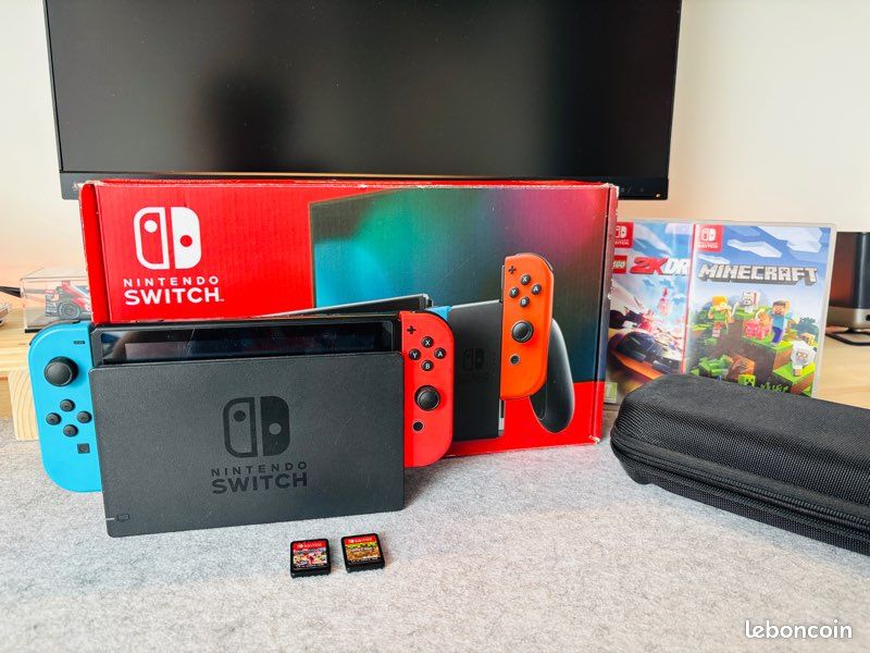 Switch oled parfait état + mario kart + minecraft (image 2)