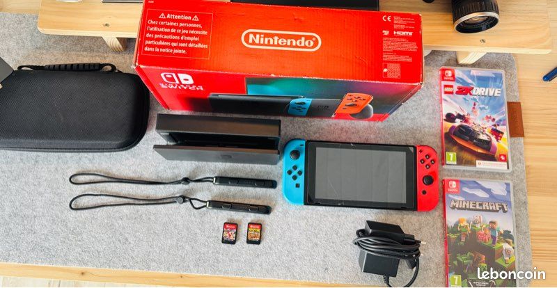Switch oled parfait état + mario kart + minecraft (image 1)