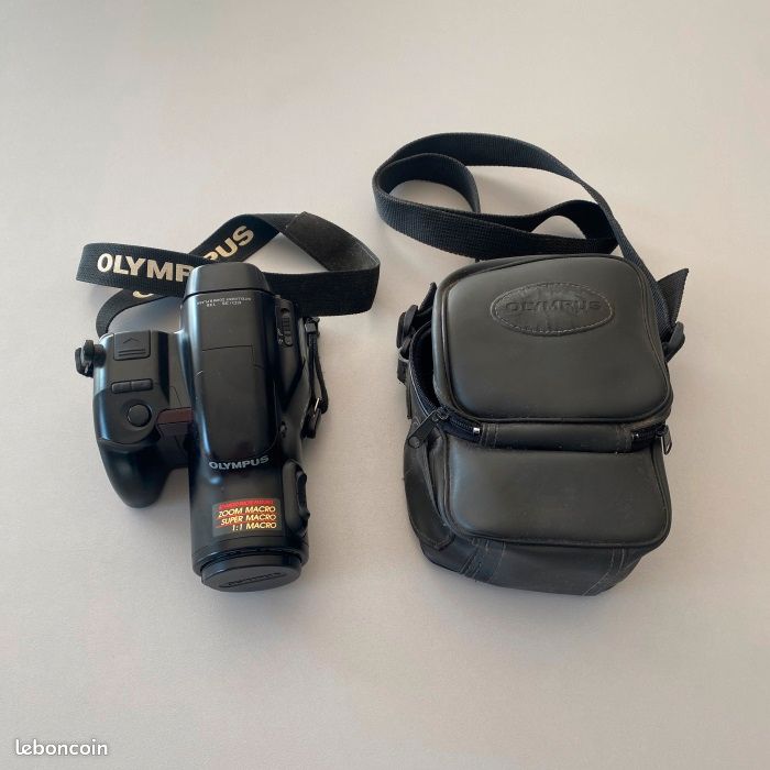 Olympus IS2 DLX (1) Olympus IS2-DLX ou IS2000 Objectiva zo