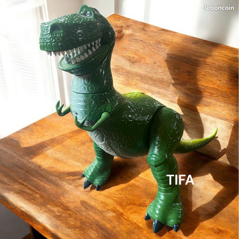 Jouet electronique dinosaure Rex Toy Story Disney store Jeux
