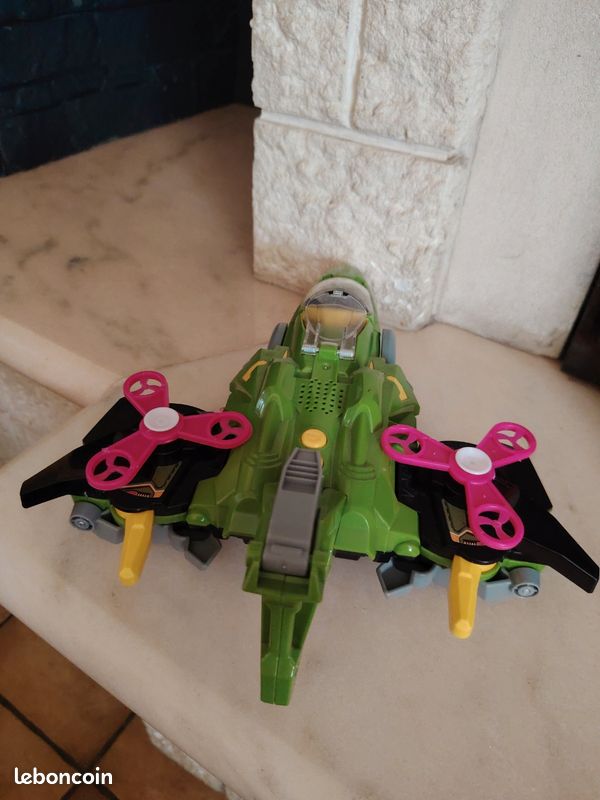 VTech Switch & Go Dinos Pulsor - Thérizinosaure Transformable En Avion De Combat Avec Projections Lumineuses