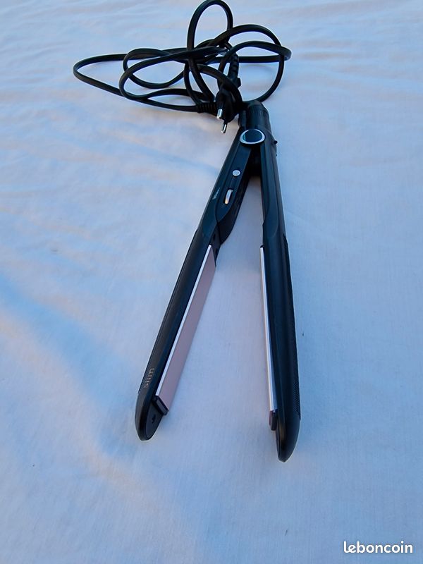 Fer à lisser les cheveux (image 1)