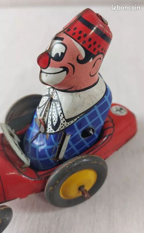 Ancienne voiture tôle Jouet Mécanique clown Bimbo, JOUSTRA