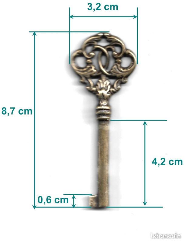 Clé de meuble en laiton (image 4)