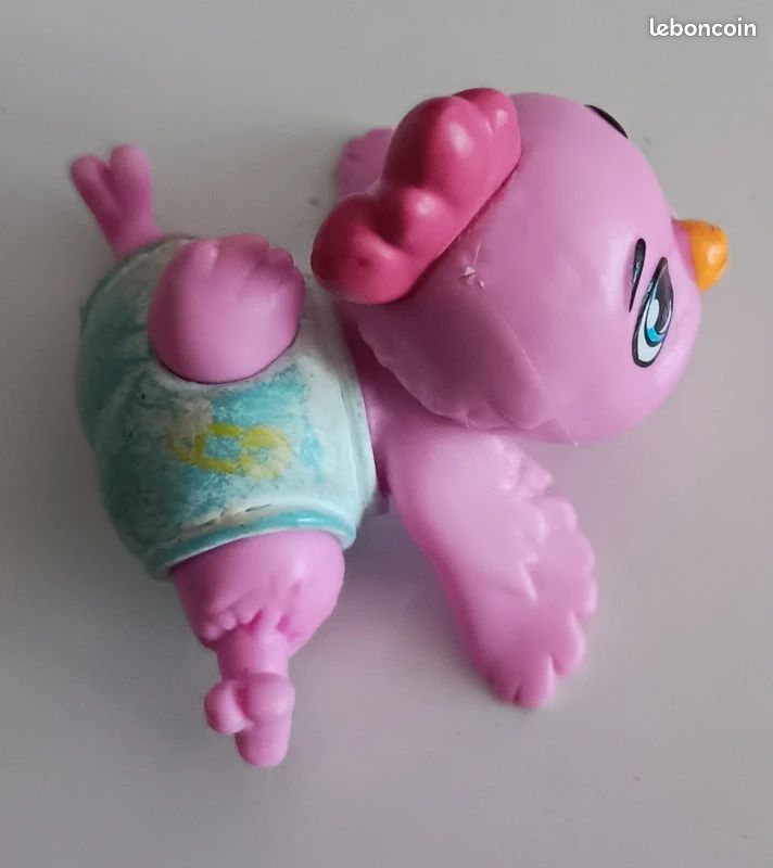 Figurine vintage Magic Diaper Baby - Poussin / Oiseau rose (Années 90) (image 1)