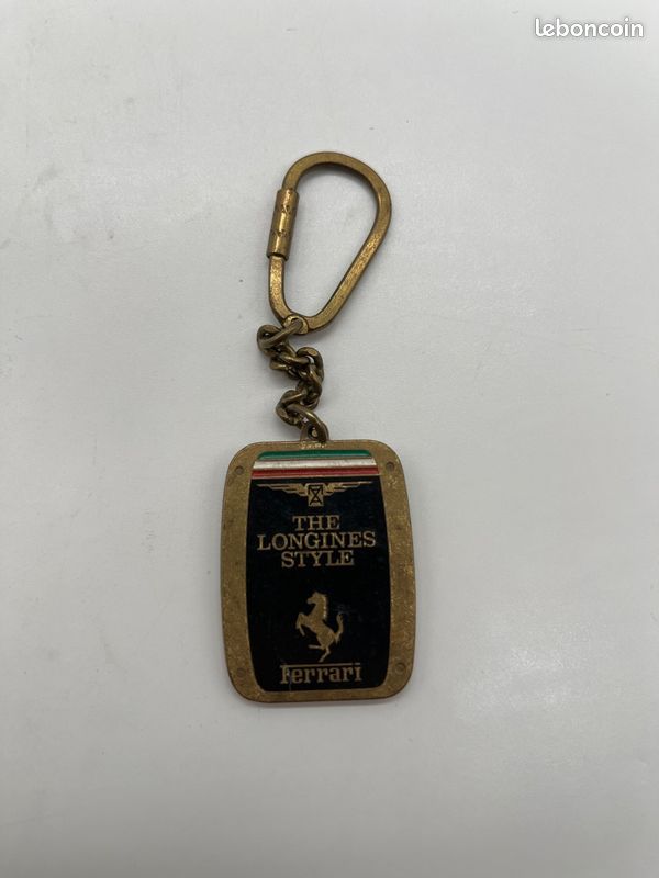 Porte-clés vintage Longines Style Ferrari métal doré émail noir collection (image 1)