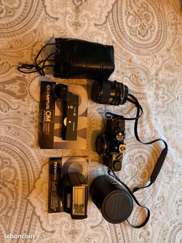 Lot appareil photo Olympus OM2 n et ses accessoires (image 1)