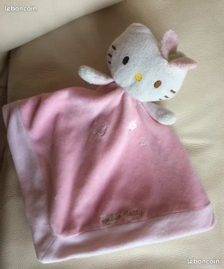 Kitsch x Hello Kitty Taie d'oreiller en satin Visages Hello Kitty roses