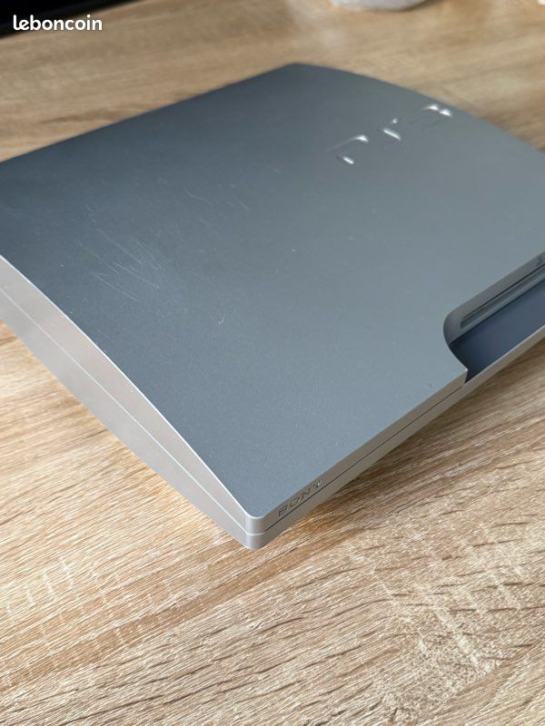 PlayStation 3 Slim Silver – Édition spéciale + 2 manettes officielles (image 9)