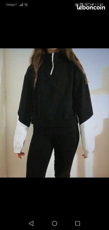 Pull blanc et noir (image 1)