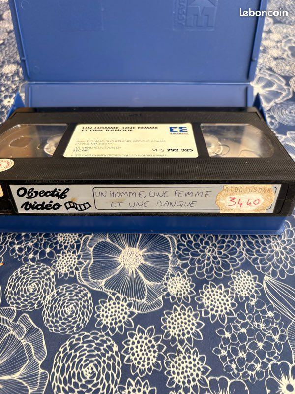 VHS - un homme une femme et une banque (image 4)