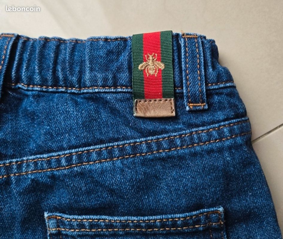 Pantalon jeans GUCCI 8 ans (image 1)