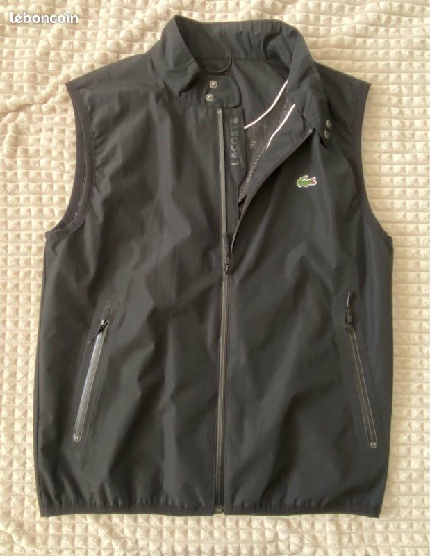 Très joli coupe vent LACOSTE noir Homme Vêtements