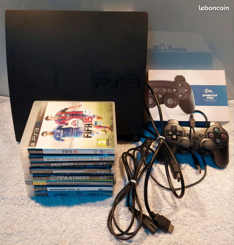 PS3 très bon état + 2 manettes + 8 jeux – Testée (image 1)