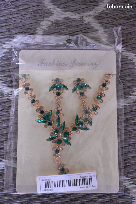 Bracelet fleur or blanc 375 topaze bleue et péridot