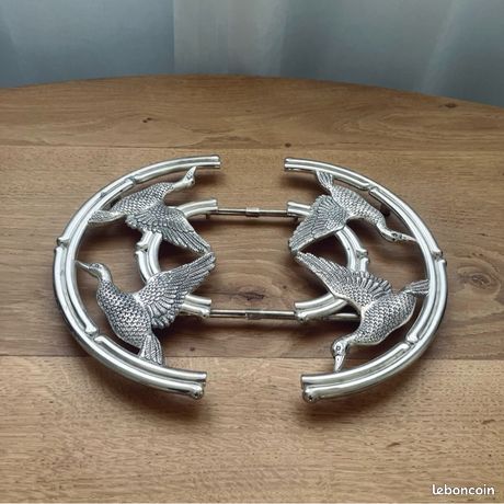 Ancien dessous de plat extensible en métal avec motifs canards (c