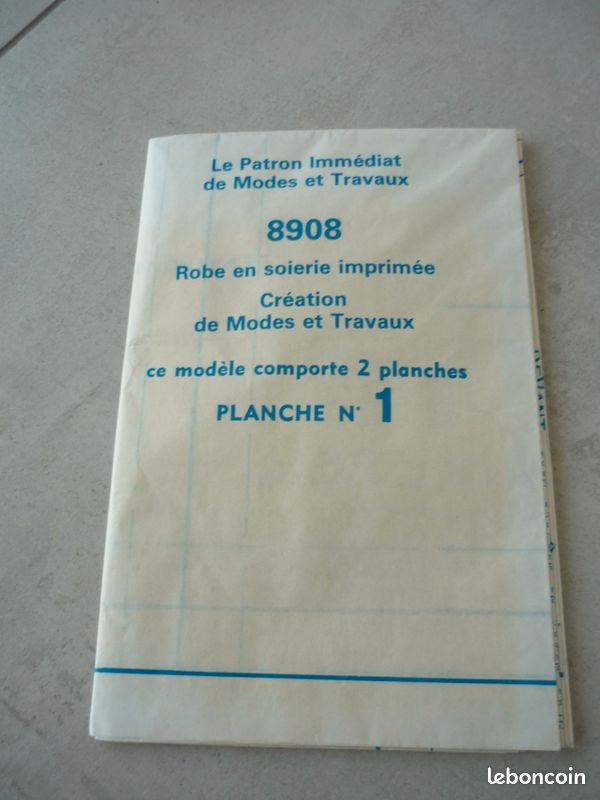 10 Etiquettes Kraft imprimé plumes blanches