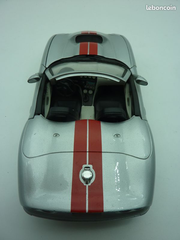 Modèle Réduit Shelby Series 1 1999 – échelle 1/18 Burago 7023 – Cabriolet Noir – Incomplet (châssis Viper)