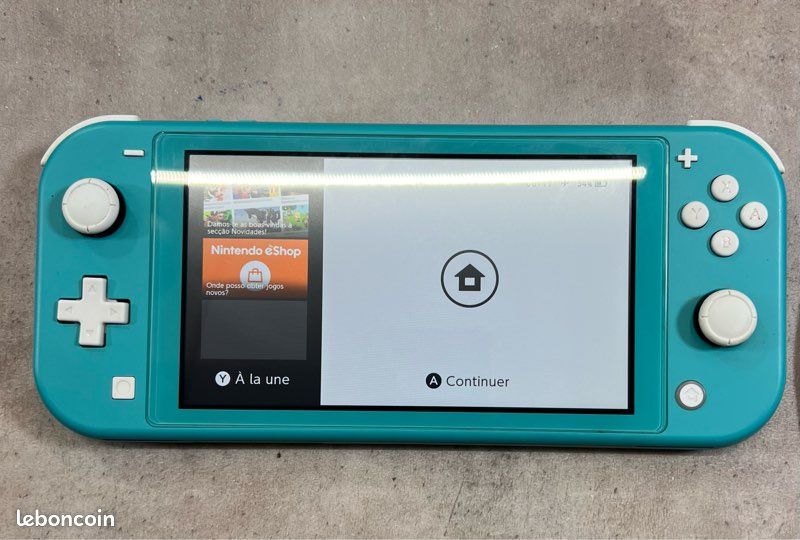 Switch lite + 60 jeux (image 2)