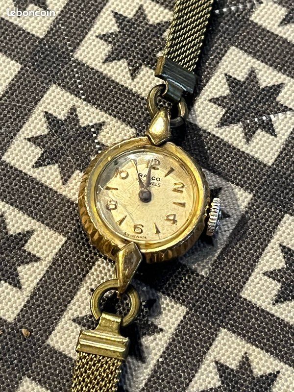 Montre Mécanique Duward-Orly Plaquée Or - Cadran Blanc, Mouvement Manuel, état De Marche - Occasion Avec Traces