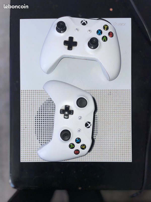 Xbox one s + 2 manette + leurs chargeurs + 10 jeux (image 2)