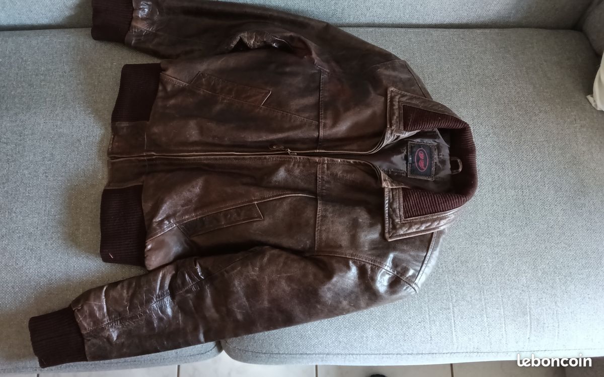 Veste vintage en cuir d agneau marron marque cuir land Taille L modèle avec col et poignets côtelés fermeture zippée bel aspect vieilli bon état (image 1)