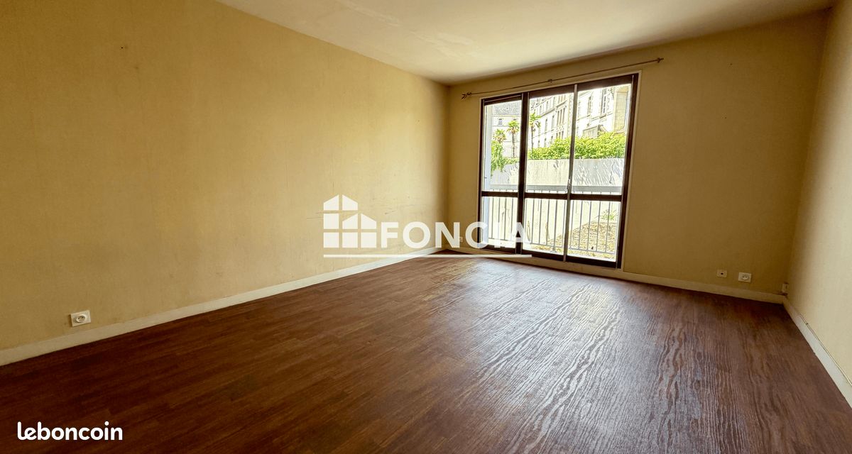 Centre-ville, Appartement T3 de 63 m² avec balcon, cave et parking privatif (image 3)