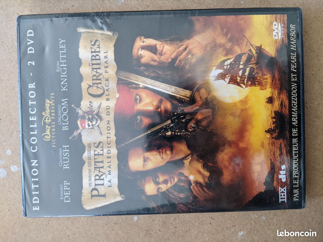 Dvd pirate des caraïbes la malédiction du Black Pearl (image 1)