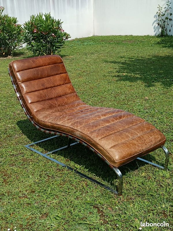 Fauteuil en cuir et acier (image 1)