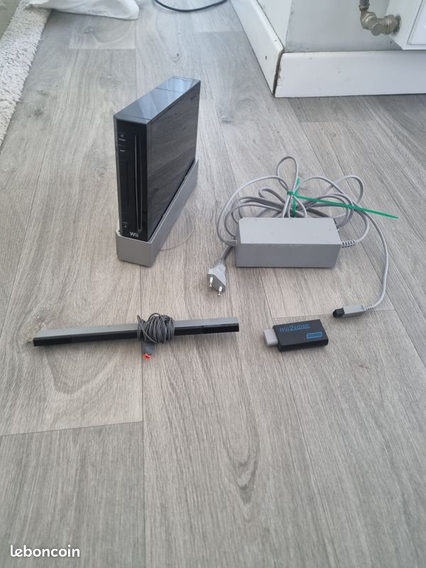 🎮Lot Nintendo Wii complète + 2 manettes + 10 jeux + accessoires (image 4)