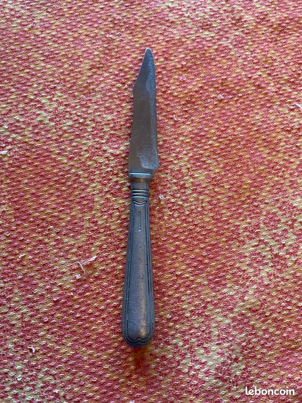 Couteau "art nouveau" ancien , en aluminonickel (image 1)
